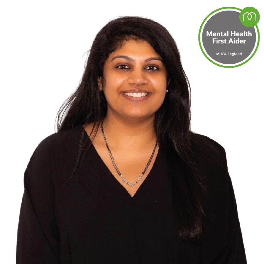 Portrait of a smiling woman wearing a black top, representing a Mental Health First Aider (MHFA England).
